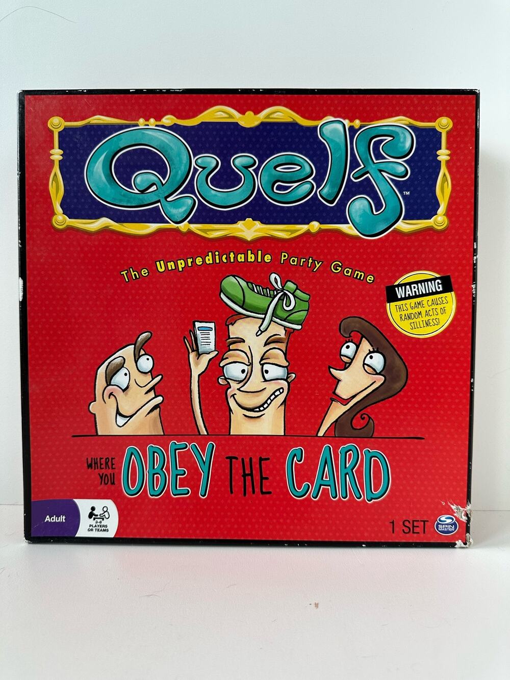 Quelf The Unpredictable Party Game, Adult, 3-8 players or teams, Spin Master